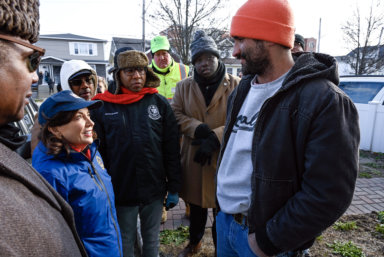 Governor Kathy Hochul speaks with residents affected by Rockaway flooding