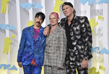 Anthony Kiedis, from left, Flea and Chad Smith, of Red Hot Chili Peppers