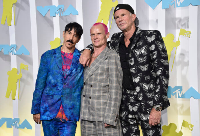 Anthony Kiedis, from left, Flea and Chad Smith, of Red Hot Chili Peppers