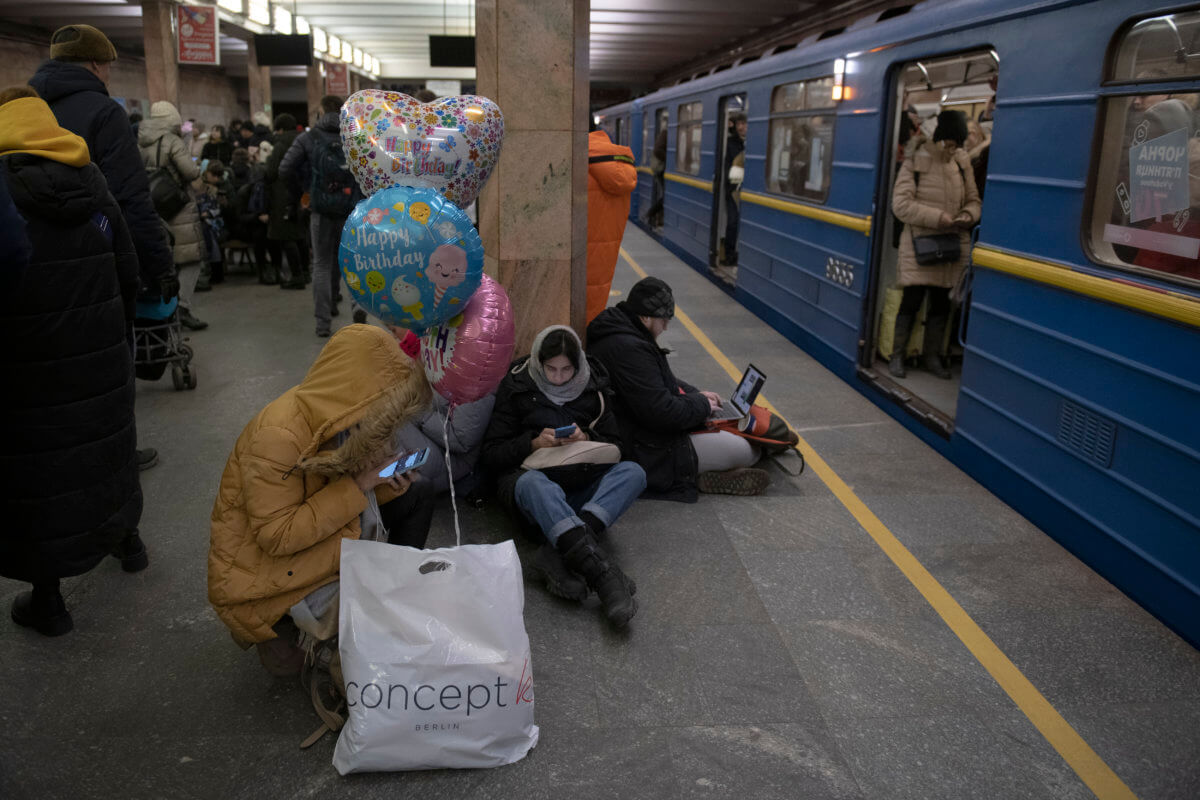 Ukraine launches more drone strikes deep into Russia, hitting Putin's vulnerable military installations 2 Ukraine residents take shelter during air raid