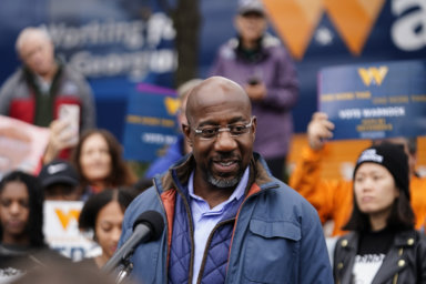 Democratic Raphael Warnock speaks during an election day canvass launch on Dec. 6.
