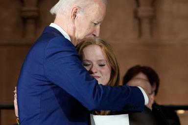 President Joe Biden hugs Sandy Hook survivor Jackie Hegarty