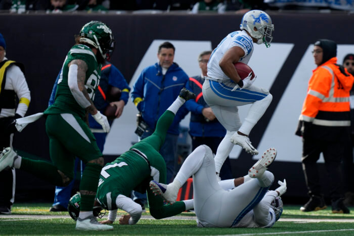 Detroit Lions wide receiver Kalif Raymond returns a punt for a touchdown against the Jets.