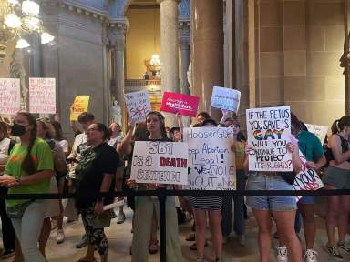 Abortion-rights protesters fill Indiana Statehouse corridors and cheer outside legislative chambers, Friday, Aug. 5, 2022.