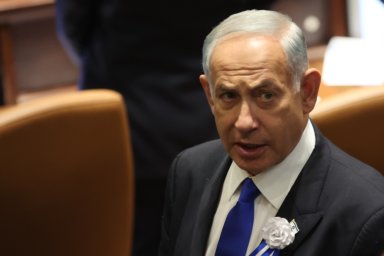 Israel's Likud Party leader Benjamin Netanyahu arrives during the swearing-in ceremony for Israeli lawmakers at the Knesset.