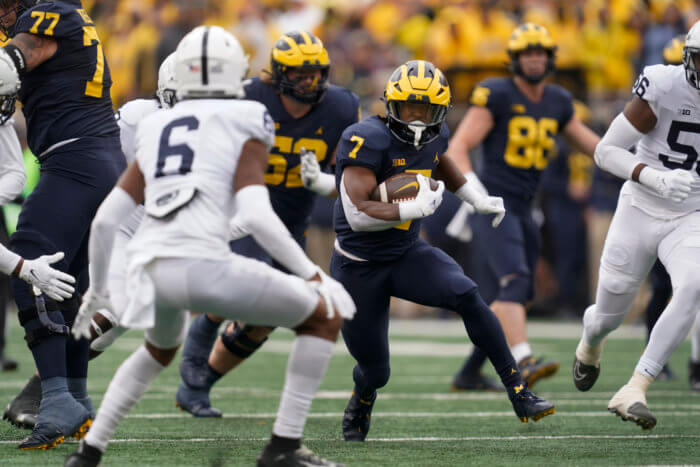 College Football Player Props and Best Bets for Michigan, Ohio State, TCU, and Georgia 7 Donovan Edwards Michigan college football