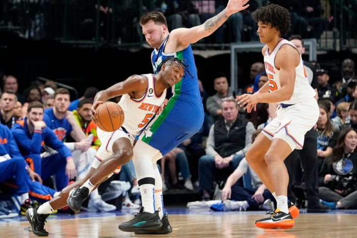 How are Knicks impacted by NBA's new CBA deal in 2023? 4 Knicks guard Immanuel Quickley drives against Dallas Mavericks guard Luka Doncic.