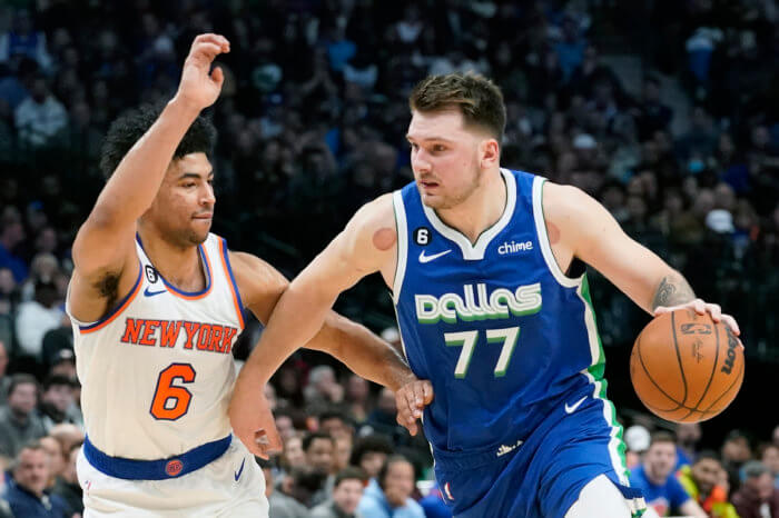 Luka Doncic drives against the Knicks