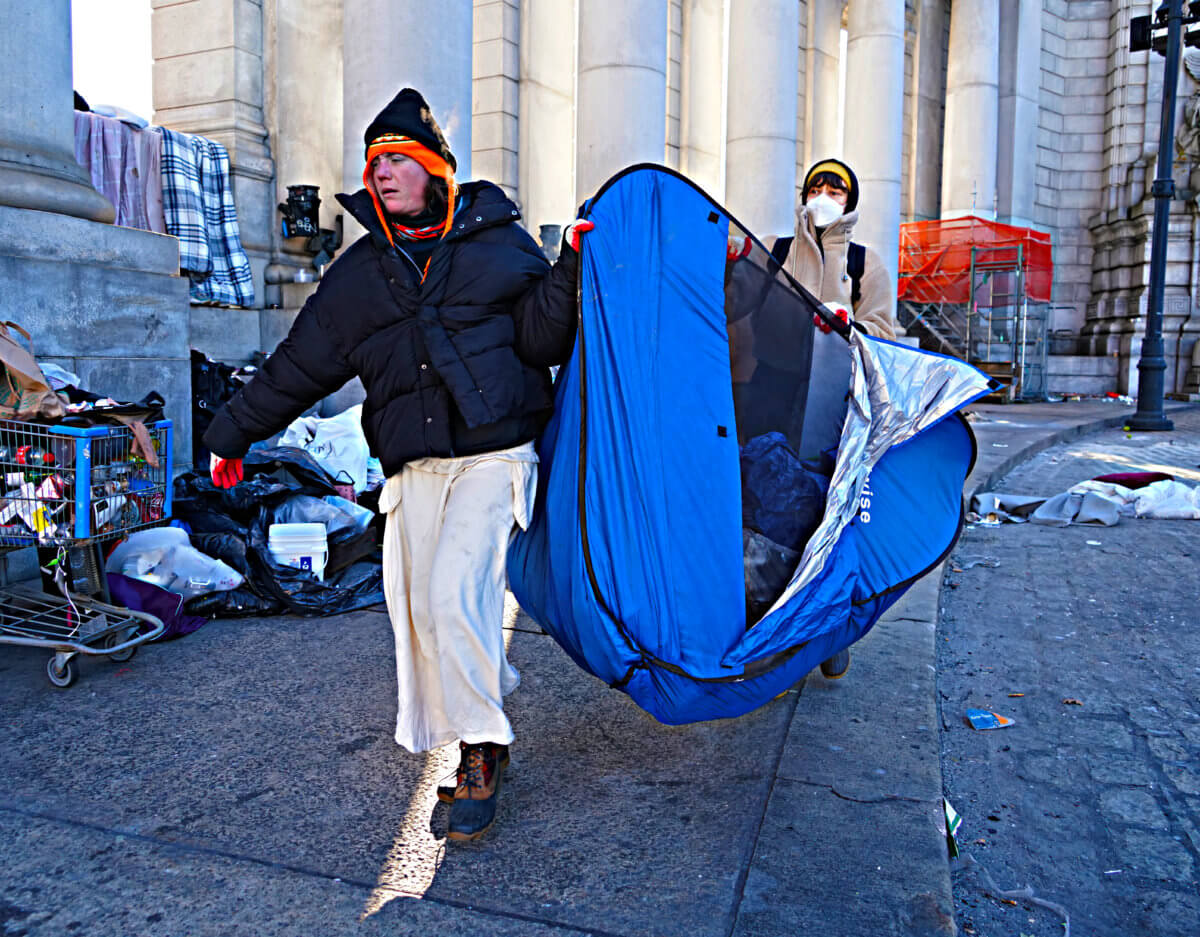 Homeless individuals being relocated in Manhattan
