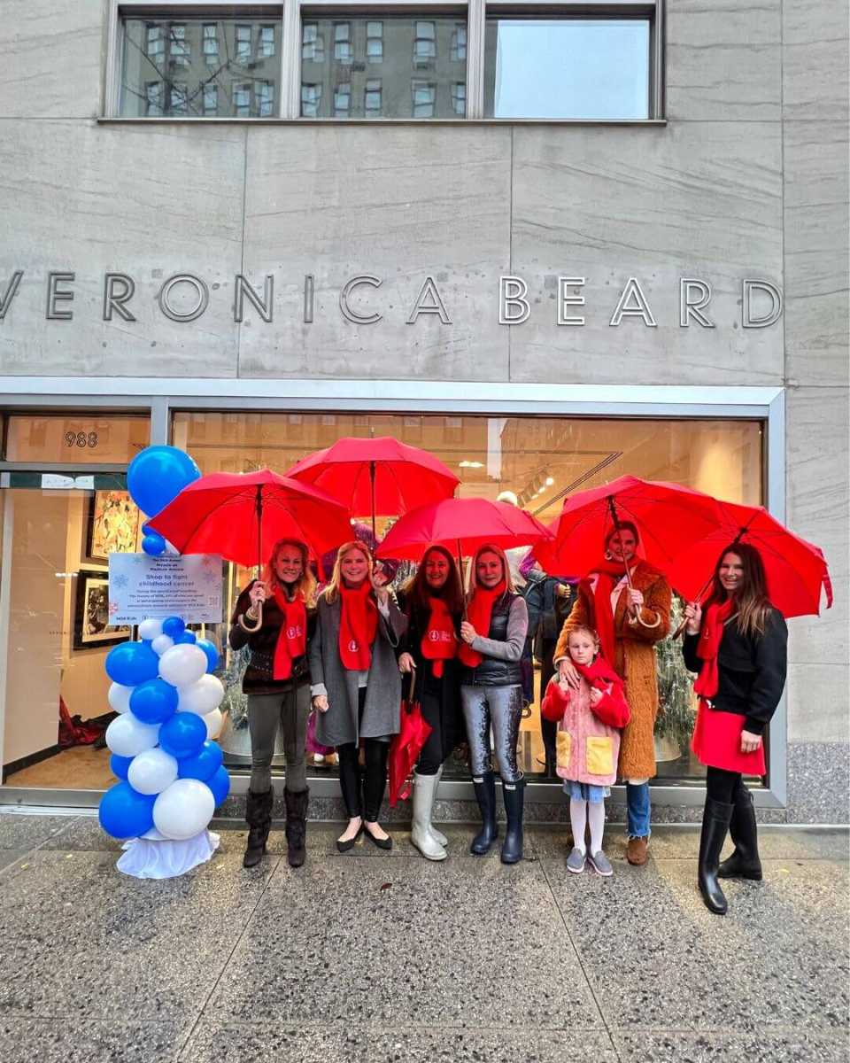 Miracle on Madison Avenue hosts outside of a store