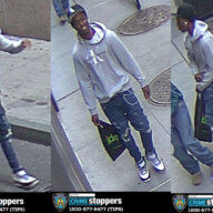 This man is wanted for punching a man for no apparent reason in the Financial District.