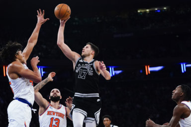 Doug McDermott drives against the Knicks
