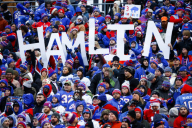 Damar Hamlin signs during the Bills game
