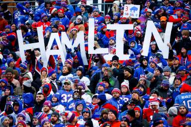 Damar Hamlin signs during the Bills game
