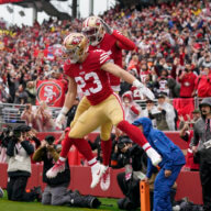 The 49ers celebrate a touchdown in their win over the Seahawks and will now face the Eagles