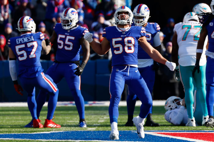 Matt Milano and the Bills celebrate a sack