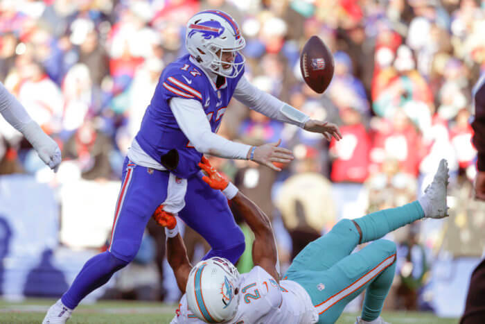 Josh Allen of the Bills fumbles against the Dolphins