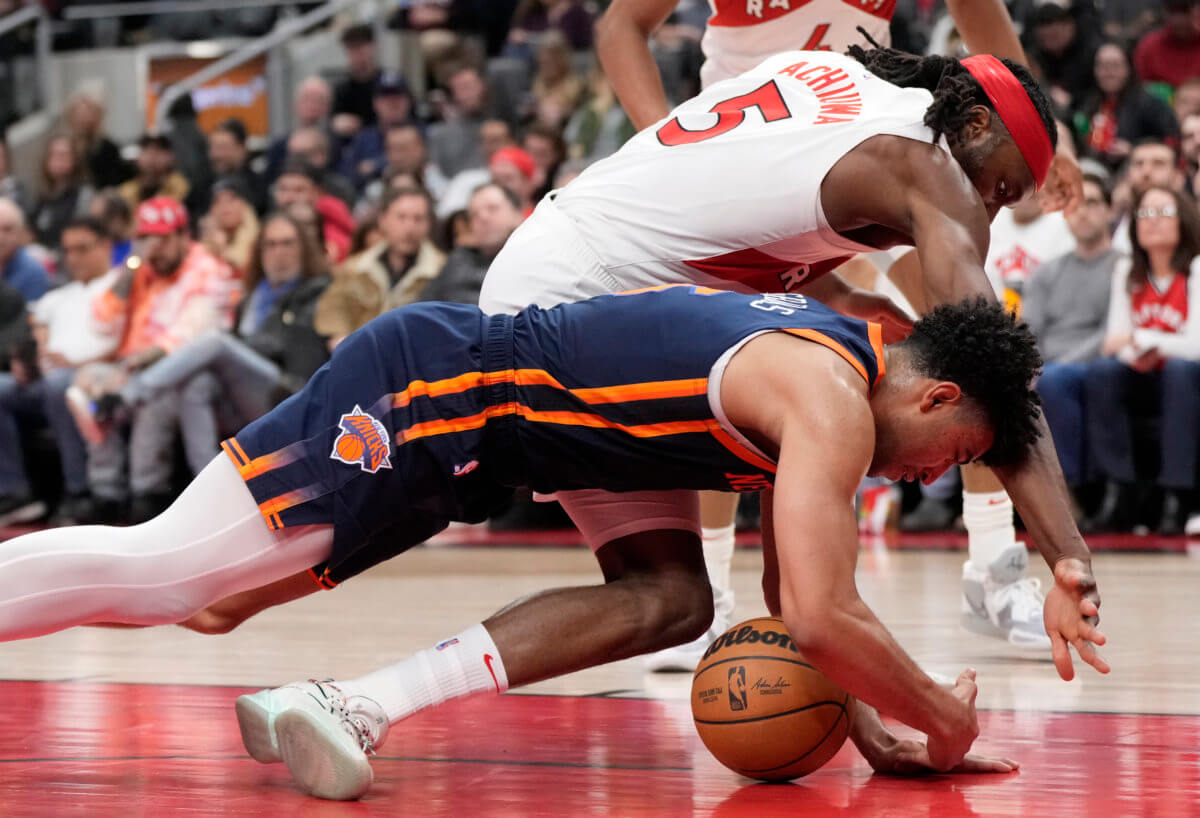 Quentin Grimes of the Knicks dives for a loose ball