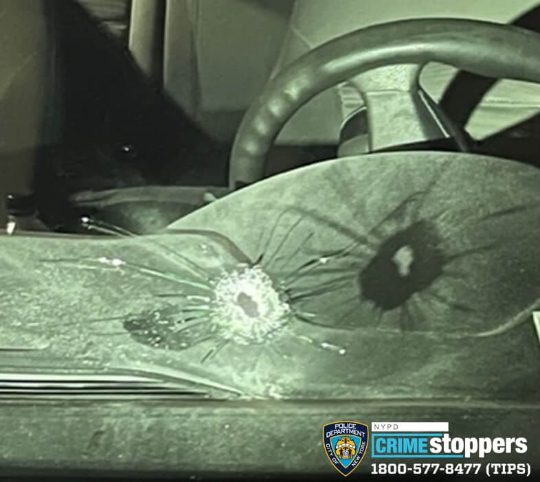 Bronx officer shot and injured in hail of bullets, teenage suspect in custody: NYPD 4 Vehicle where Bronx police officer was shot