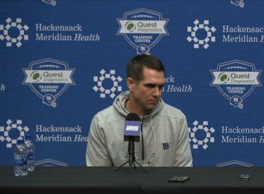 Giants general manager Joe Schoen talks at the end of season press conference