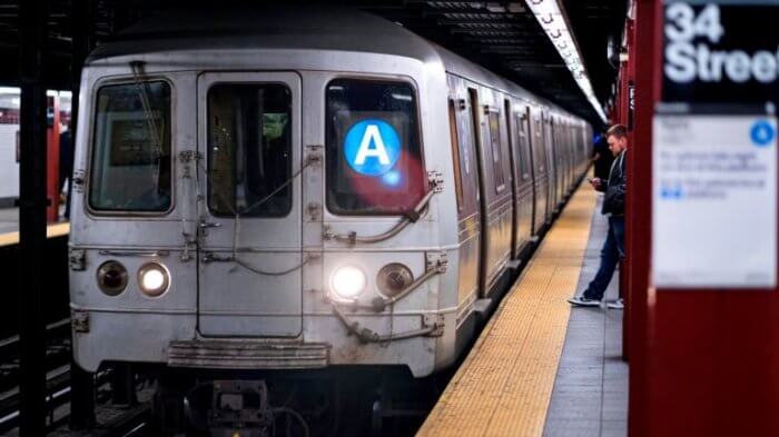 An MTA A train pulls into 34th Street-Penn Station.