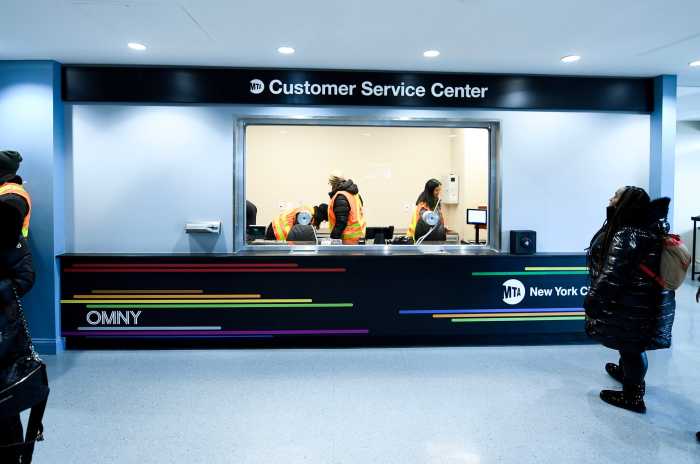 bright new MTA customer service center with people working to assist customers