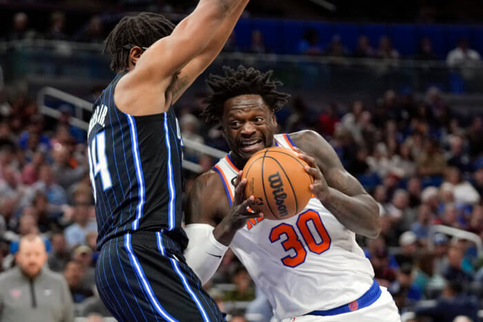 Julius Randle of the Knicks drives against the Magic