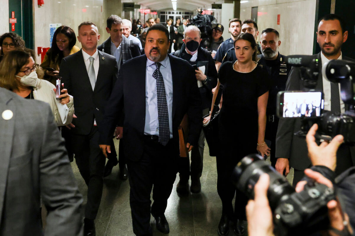 Manhattan District Attorney Alvin Bragg exits the courtroom after the jury found the Trump Organization guilty on all counts in a criminal tax fraud case, Tuesday, Dec. 6, 2022, in New York.