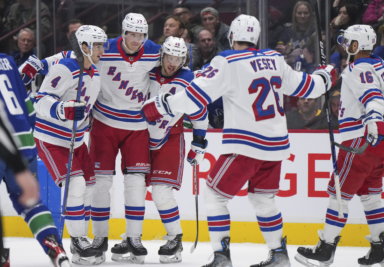 Rangers beat Canucks 6-4