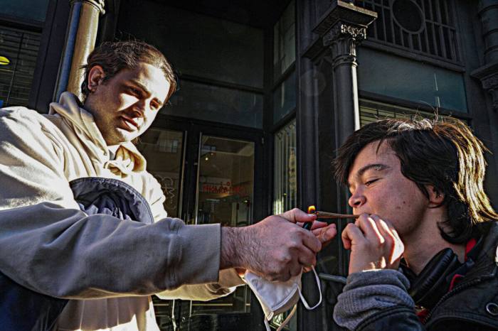 Cannabis users outside East Village marijuana shop