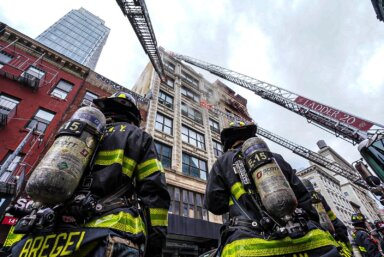 Firefighters respond to a two-alarm fire at a Soho building.