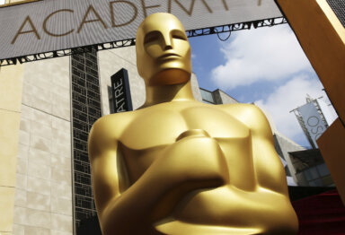 In this Feb. 21, 2015 file photo, an Oscar statue appears outside the Dolby Theatre for the 87th Academy Awards in Los Angeles. This year's Oscars will be held Sunday, March 12. The ceremony is set to begin at 8 p.m. EST and be broadcast live on ABC.