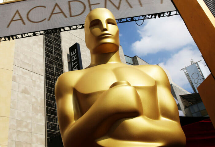 In this Feb. 21, 2015 file photo, an Oscar statue appears outside the Dolby Theatre for the 87th Academy Awards in Los Angeles. This year's Oscars will be held Sunday, March 12. The ceremony is set to begin at 8 p.m. EST and be broadcast live on ABC.