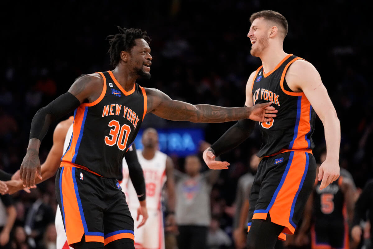 Julius Randle and Isaiah Hartenstein of the Knicks