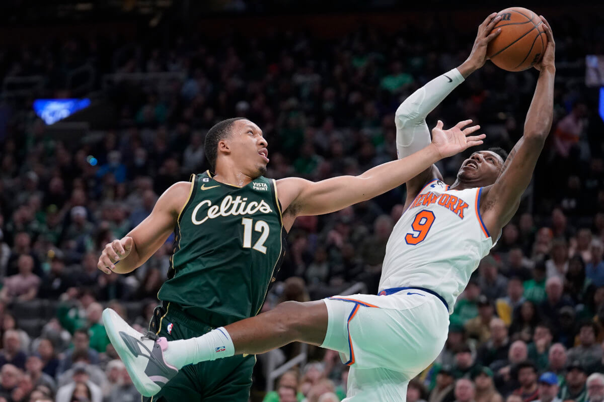 RJ Barrett of the Knicks grabs a rebound