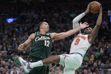 RJ Barrett of the Knicks grabs a rebound