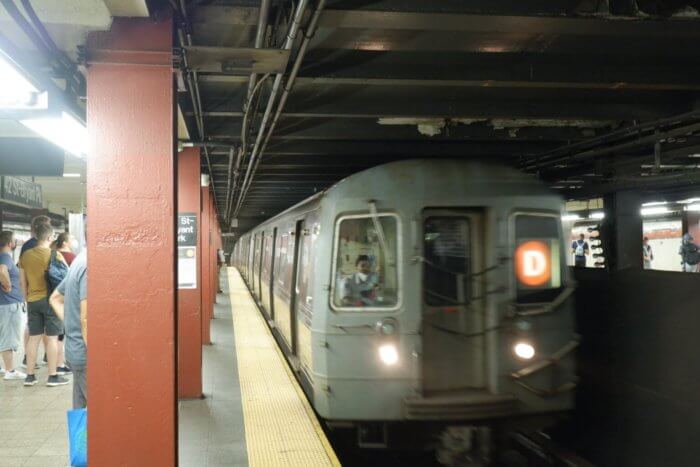 An MTA train pulls into the station in Brooklyn.