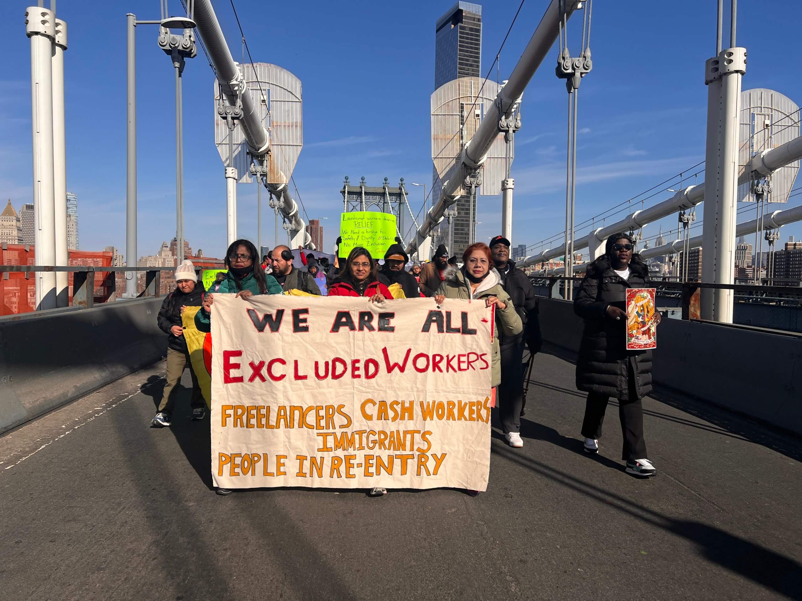 Protesters shut down Manhattan Bridge to urge Hochul to establish unemployment fund for excluded workers 5 laborers march
