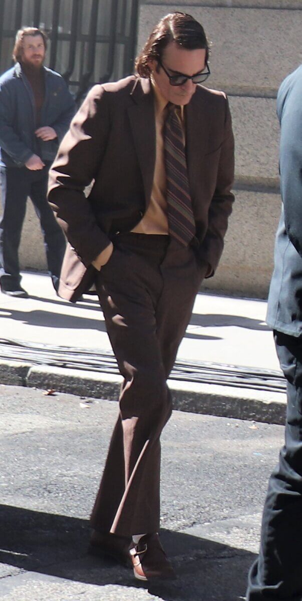 Joaquin Phoenix, who plays Joker, walks to the set of Joker 2, "Joker: Folie à Deux." Phoenix cut an engrossed figure (Photo by Michael Dorgan)