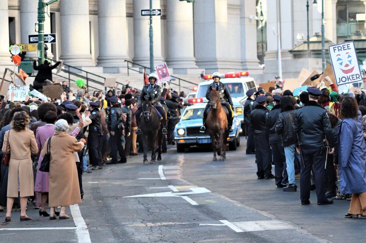 The Joker, in a police van, is led in front of the Manhattan Criminal Courthouse on the set of Joker 2, "Joker: Folie à Deux" (Photo by Michael Dorgan)