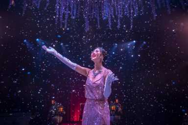 A woman enjoying The Queen’s Ball: A Bridgerton Experience