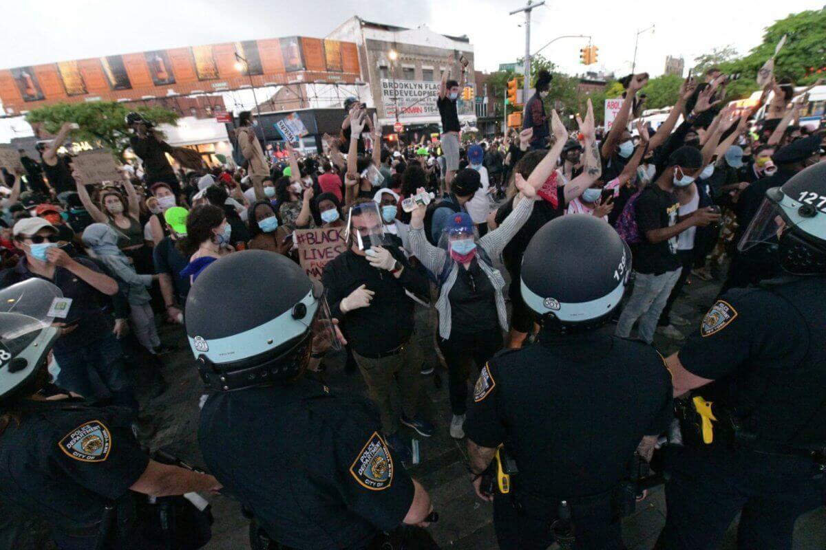 NYPD officers and protesters clash during the George Floyd protests