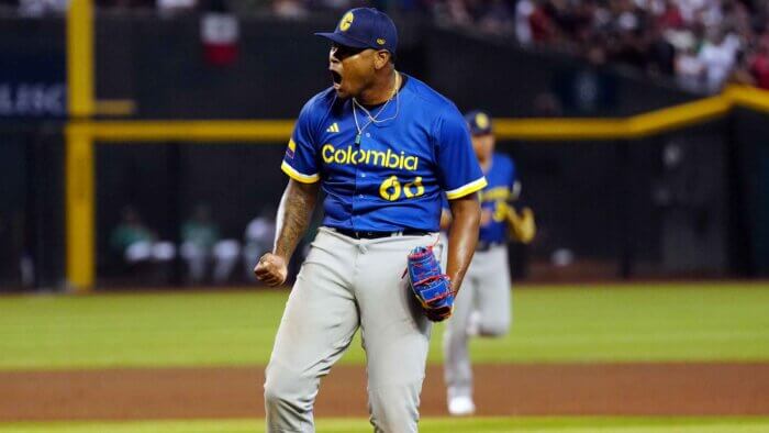 Guillermo Zuñiga celebrates for Colombia in the World Baseball Classic