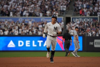 Yankees rookie Anthony Volpe rounds the bases after hitting his first career home run in the majors on April 14, 2023.