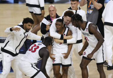 San Diego State celebrates getting into the NCAA championship