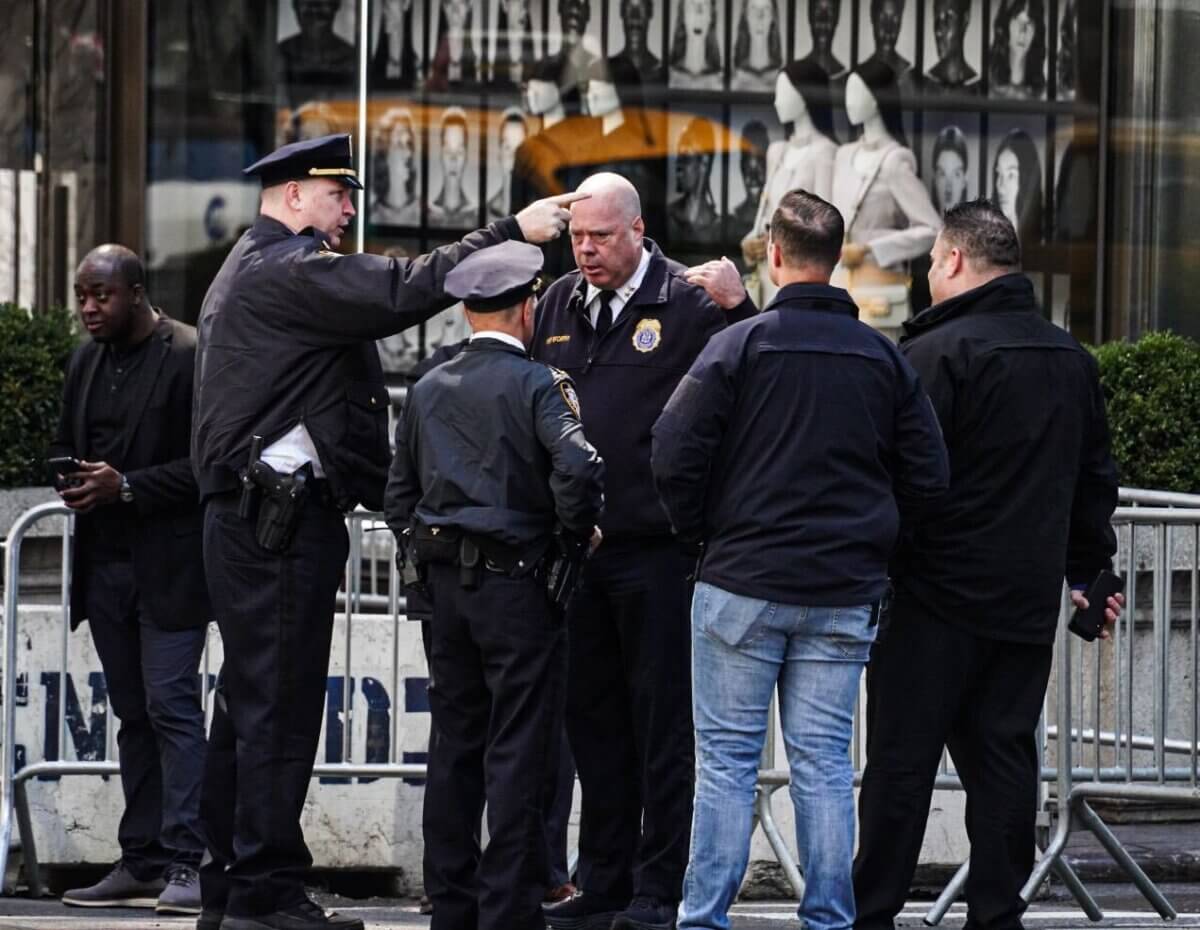 'Control yourselves': Mayor Adams, NYPD issue stern warning to protesters, Marjorie Taylor Greene ahead of Trump surrender Tuesday 3 Police officials and officers near Trump Tower