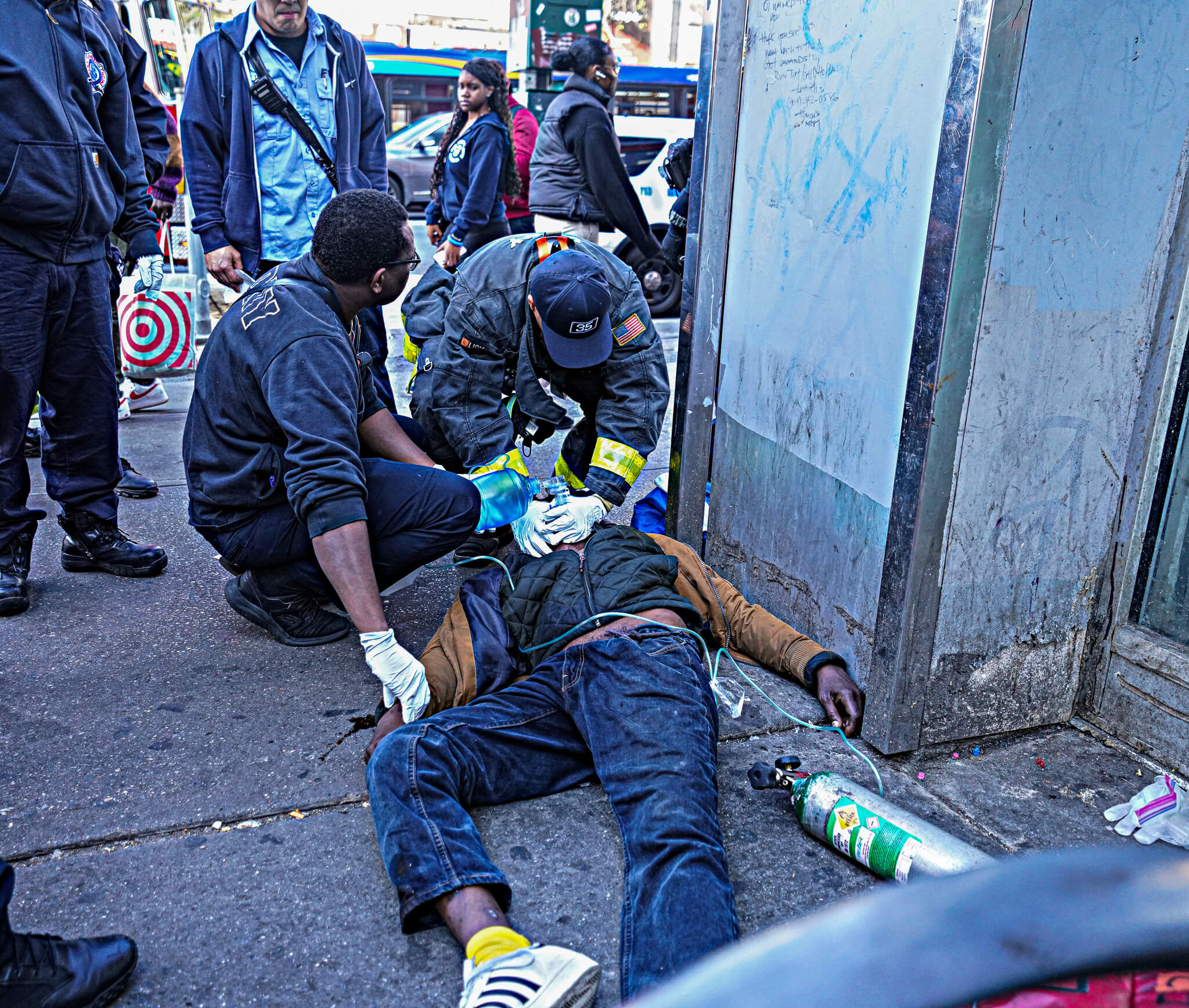 Reporter's Notebook: Witnessing an overdose, and a lack of humanity, on a spring morning in Harlem 5 First responders assisting a man overdosing in Harlem