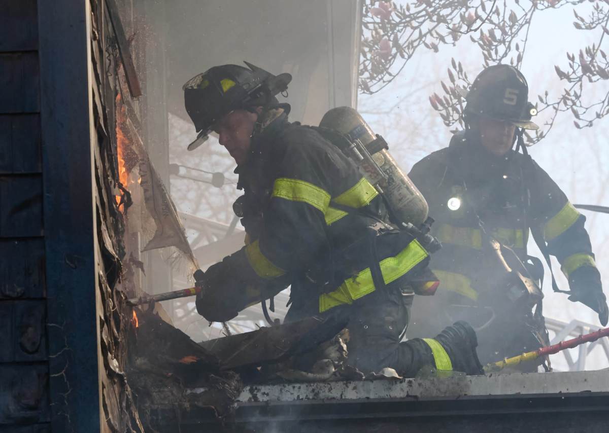Firefighters work to subdue the blaze