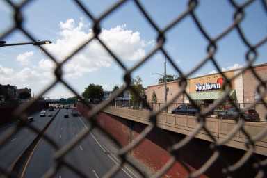 Foodtown-bruckner-expressway-fence-long-scaled-1-1200×800-1