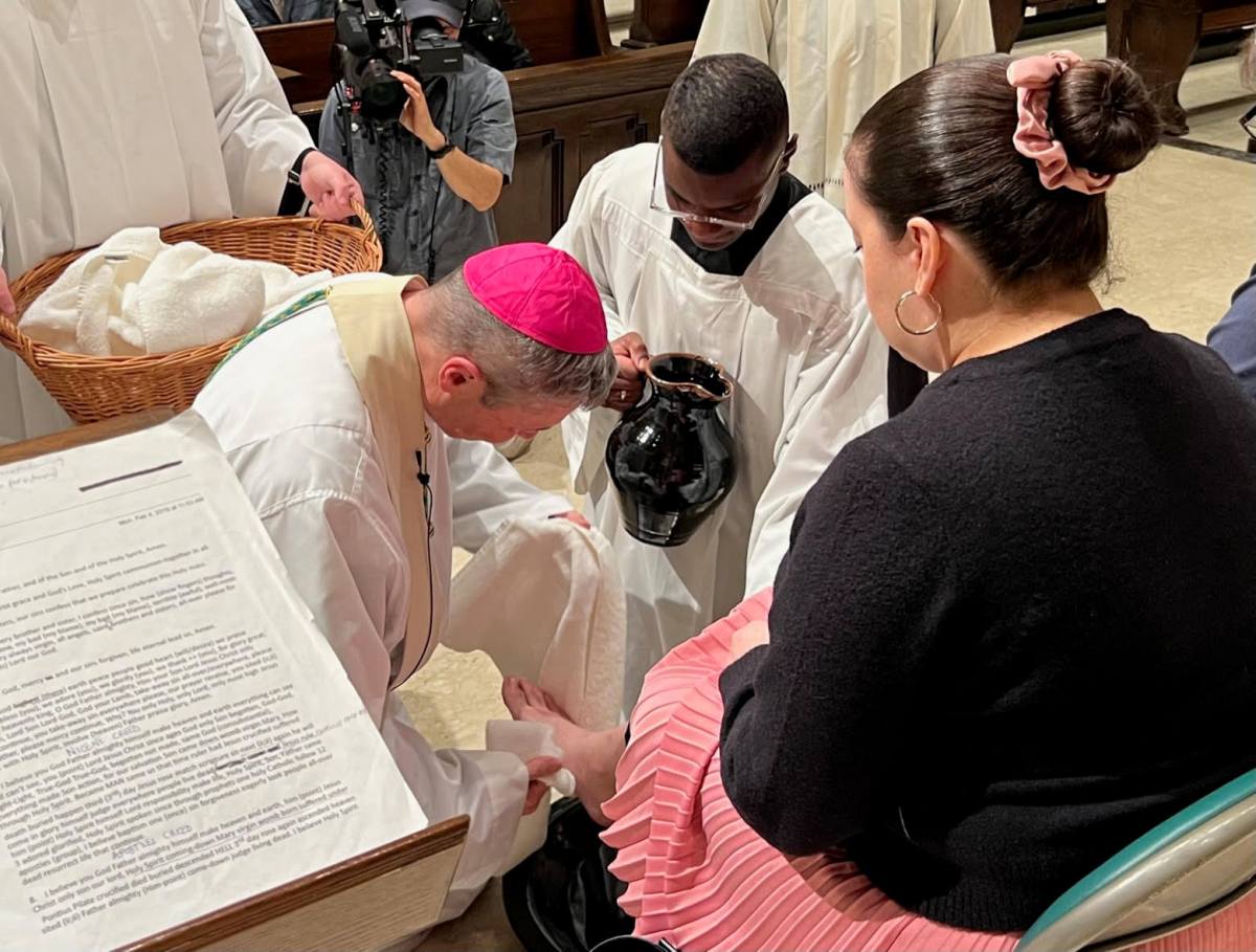 Bishop of Brooklyn Robert Brennan washes feet on Holy Thursday